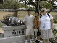 Osamu Yuko and Sandy and the Dazaifu Lucky cow.